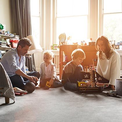 Family playing together in their home